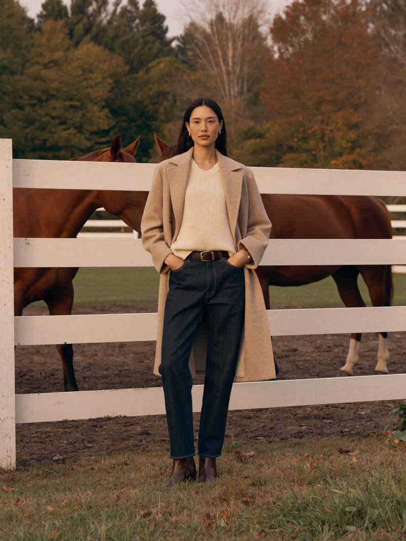 The camel coat, paddock-side